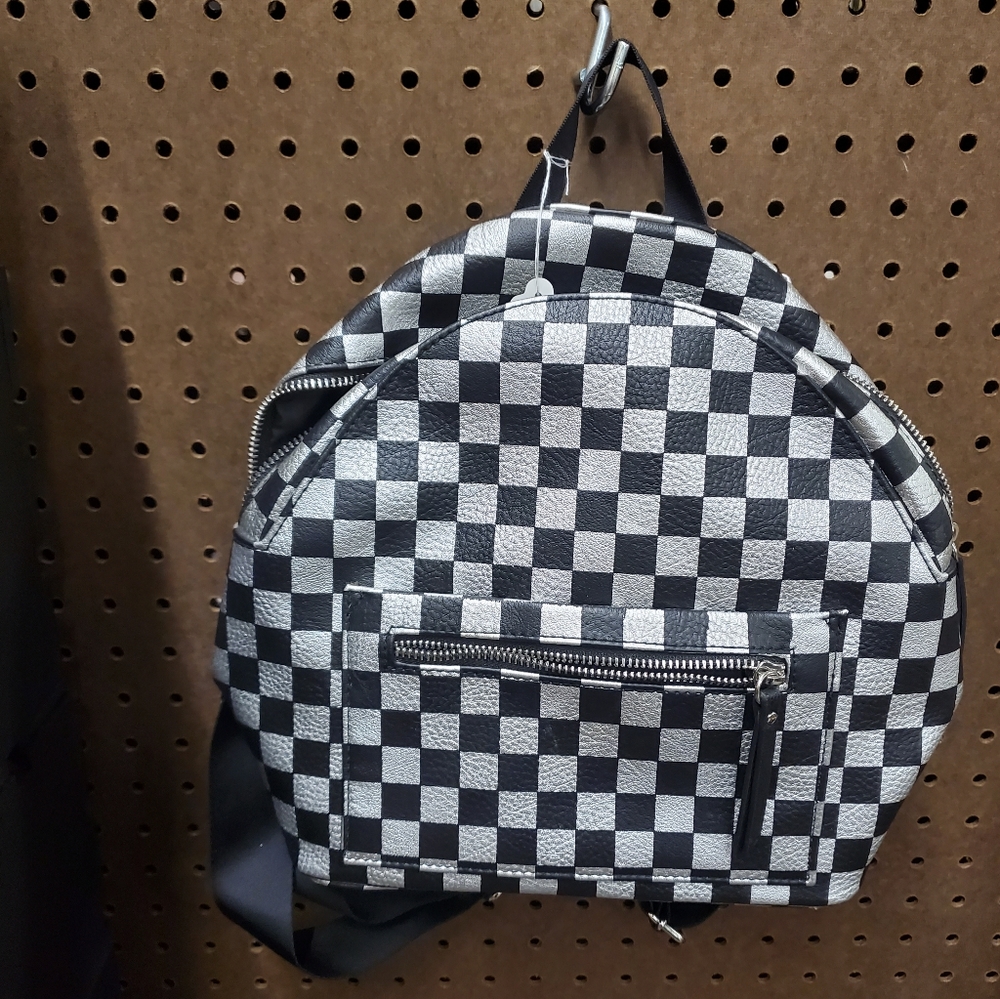 Black and silver mini backpack.